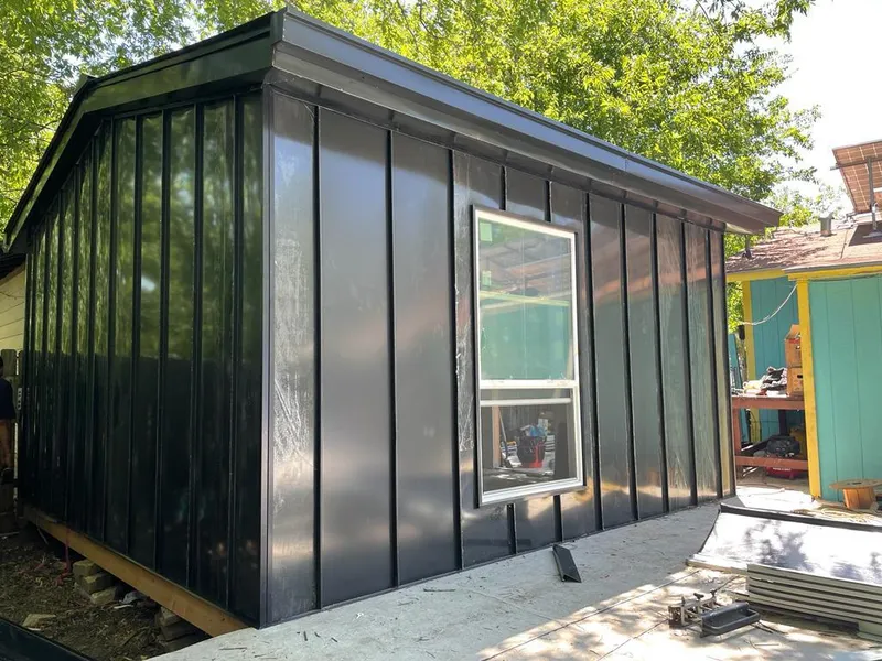 Black standing seam metal wall panels for Metal Roof Installation in Rupert